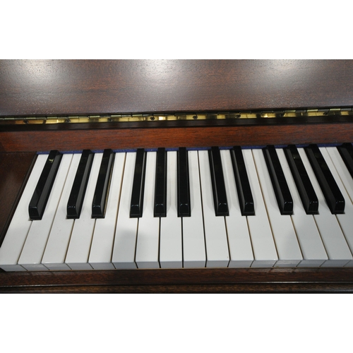 1201 - A WELMAR MAHOGANY UPRIGHT OVERSTRUNG PIANO, the hinged lid enclosing the gold painted cast iron fram... 