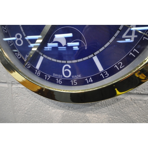 1206 - A VACHERON CONSTANTIN GENEVE DEALERS ADVERTISING WALL CLOCK, with a blue dial, diameter 40cm (condit... 