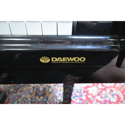 1210 - AN OFFENBACH GLOSSY BLACK 5FT3 OVERSTRUNG BABY GRAND PIANO, serial number G019297, the hinged lid en... 