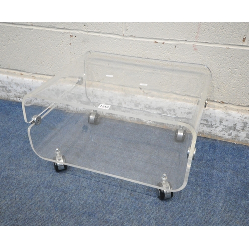 1213 - IN THE MANNER OF DAVID LANGE, A CLEAR PERSPEX OCCASIONAL TABLE, raised on castors, width 55cm x dept... 