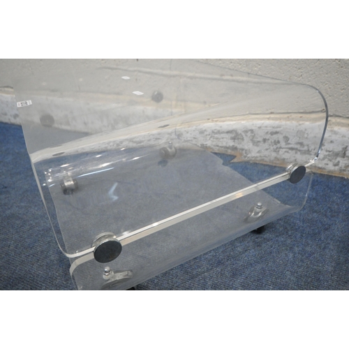 1213 - IN THE MANNER OF DAVID LANGE, A CLEAR PERSPEX OCCASIONAL TABLE, raised on castors, width 55cm x dept... 