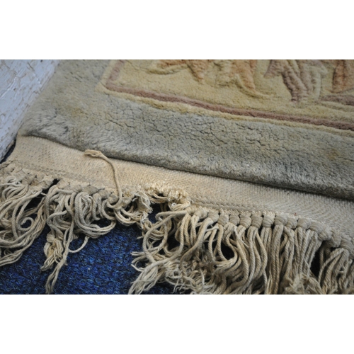 1214 - A LARGE RECTANGULAR CHINESE WOOLLEN RUG, 282cm x 180cm (condition report: has a few tassels missing ... 