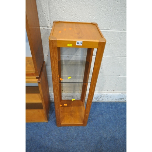 1220 - A MID CENTURY DANISH TEAK ULDUM PILLAR, with two smoked glass shelves, 31cm squared x height 91cm, a... 