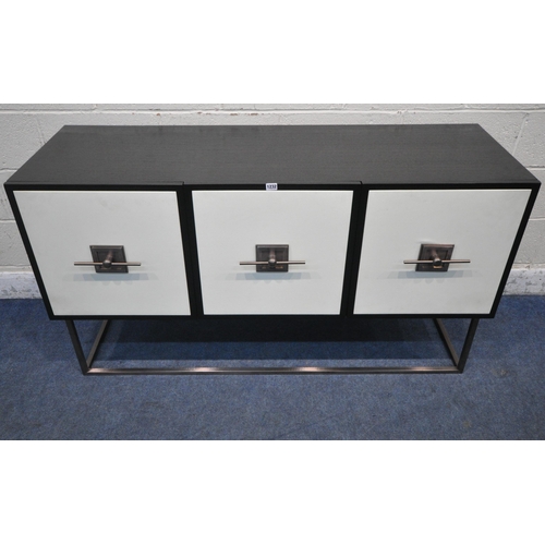 1232 - A MODERN EBONISED OAK SIDEBOARD, fitted with three leatherette fronted doors, raised on a metal fram... 