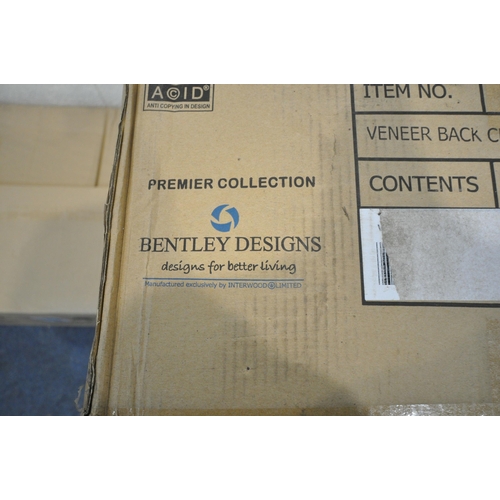 1241 - THREE BOXES EACH CONTAINING A PAIR OF BENTLEY DESIGNS WALNUT VENEER BACK CHAIRS, with linen upholste... 