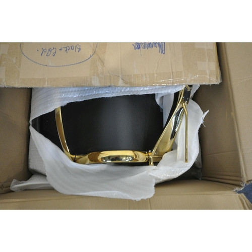 1244 - CULT FURNITURE, A BOXED BRIA LOW BLACK AND GOLD SWIVEL OFFICE CHAIR (condition report: box is not or... 