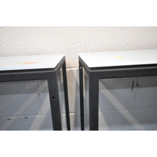 1245 - A PAIR OF RV ASTLEY AMADEO RECTANGULAR SIDE TABLES, with milky glass surface, raised on a metal fram... 