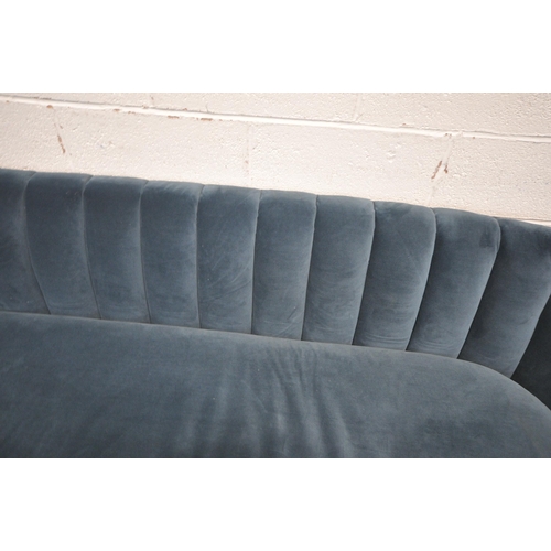 1259 - A BLUE PLUSH VELVET SOFA, of low proportions, length 208cm x depth 84cm x height 66cm x height to se... 