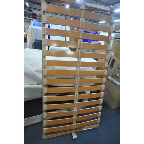 1265 - A HULSTA SINGLE MATTRESS, with a matching white bedstead (condition report: side rails, slats and bo... 