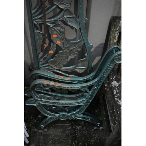 1005 - A DISMANTLED 20TH CENTURY PAINTED CAST IRON GARDEN BENCH, with fern leaf back and foliate decoration... 