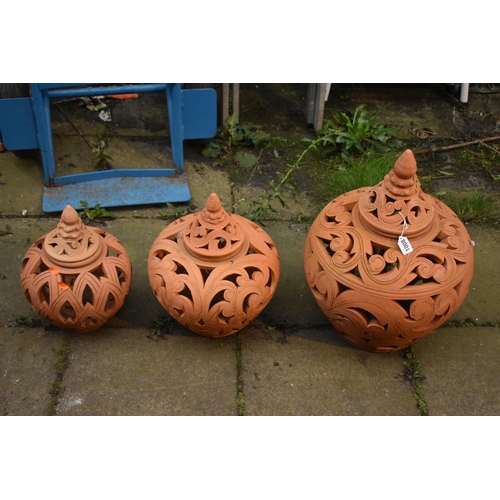 1008 - A SET OF THREE GRADUATED TERRACOTTA CLAY POTS, diameter 37cm x height 49cm (3)