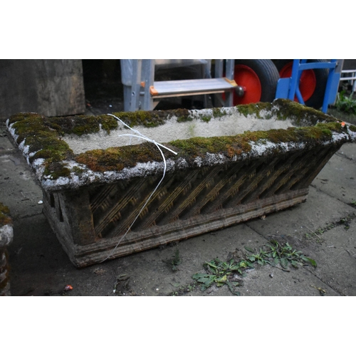 1010 - A WEATHERED COMPOSITE SQUARE PLANTER, with a basket weave design, 55cm squared x height 23cm, along ... 