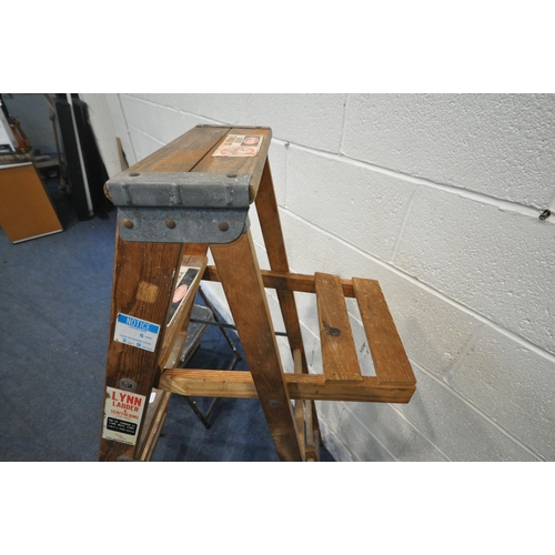 1328 - A SET OF WOODEN FOLDING STEP LADDERS, height 5ft, along with a small set of metal ladders (condition... 