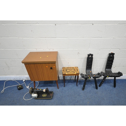 1331 - A PAIR OF EBONISED SPINNING CHAIRS, a sewing box, and a sewing machine (condition report: sewing mac... 