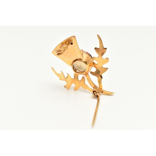 1 - A 9CT GOLD THISTLE BROOCH, set with a circular cut smoky quartz in a five claw setting, fitted with ... 