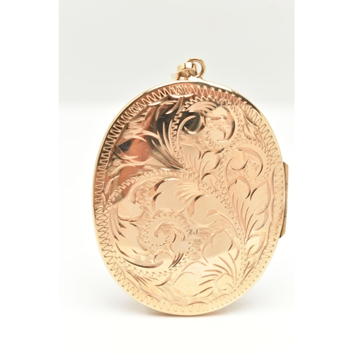 14 - A 9CT GOLD LOCKET, a large yellow gold locket with embossed scrolling acanthus detail, fitted with a... 