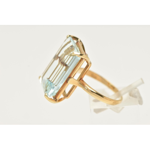 18 - A LARGE AQUAMARINE DRESS RING, an emerald cut aquamarine, approximate total weight 37ct, approximate... 