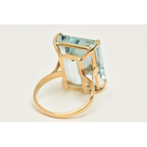 18 - A LARGE AQUAMARINE DRESS RING, an emerald cut aquamarine, approximate total weight 37ct, approximate... 