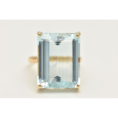 18 - A LARGE AQUAMARINE DRESS RING, an emerald cut aquamarine, approximate total weight 37ct, approximate... 