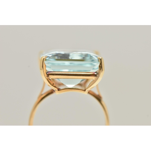 18 - A LARGE AQUAMARINE DRESS RING, an emerald cut aquamarine, approximate total weight 37ct, approximate... 