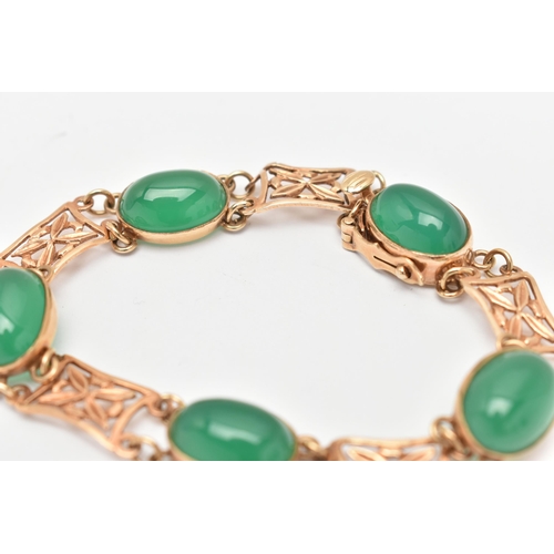 19 - A 9CT GOLD GEM SET BRACELET, a rose gold bracelet designed as open work panels interspaced with five... 