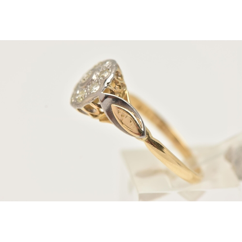 20 - A YELLOW METAL DIAMOND CLUSTER RING, of a circular form set with nine single cut diamonds, in a whit... 