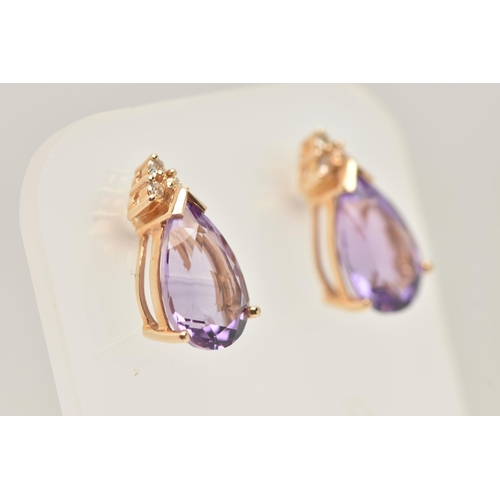 23 - A PAIR OF 14CT GOLD AMETHYST AND DIAMOND EARRINGS WITH MATCHING PENDANT, each earring set with a pea... 