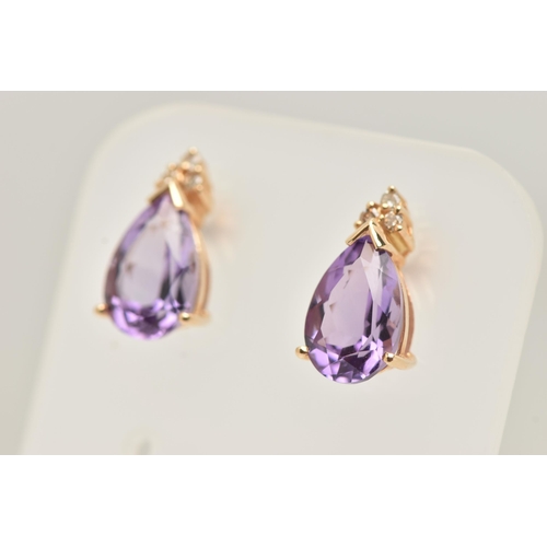 23 - A PAIR OF 14CT GOLD AMETHYST AND DIAMOND EARRINGS WITH MATCHING PENDANT, each earring set with a pea... 