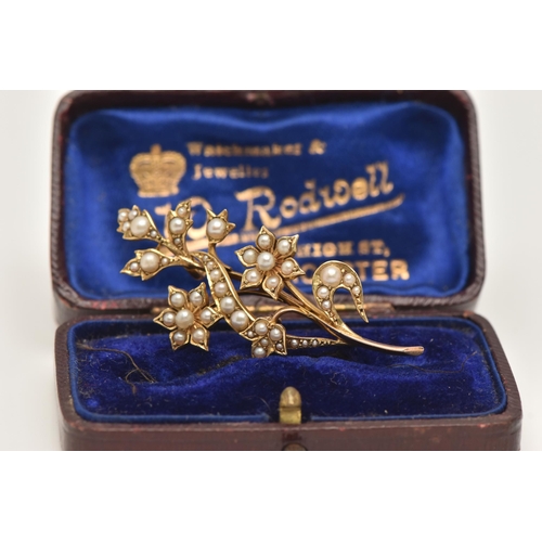 44 - A YELLOW METAL CULTURED PEARL SET BROOCH, of a floral design, set with small seed and split pearls, ... 