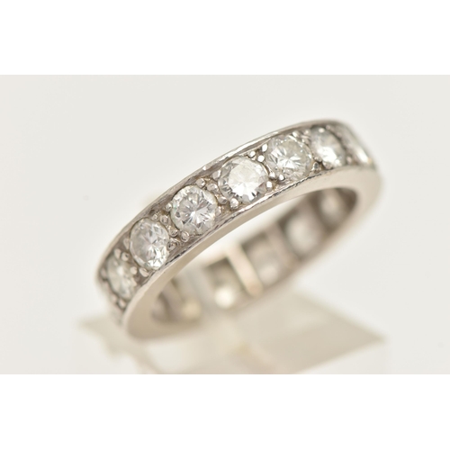 5 - A WHITE METAL DIAMOND FULL ETERNITY RING, set with approximately seventeen round brilliant cut diamo... 