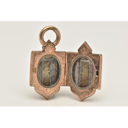 58 - A LATE 19TH CENTURY/EARLY 20TH CENTURY ROSE GOLD PLATED LOCKET, of a shield shape decorated with an ... 