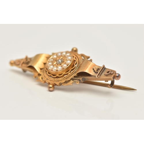 69 - A LATE 19TH CENTURY ETRUSCAN BROOCH, designed as a centrally set old cut diamond in a star setting w... 