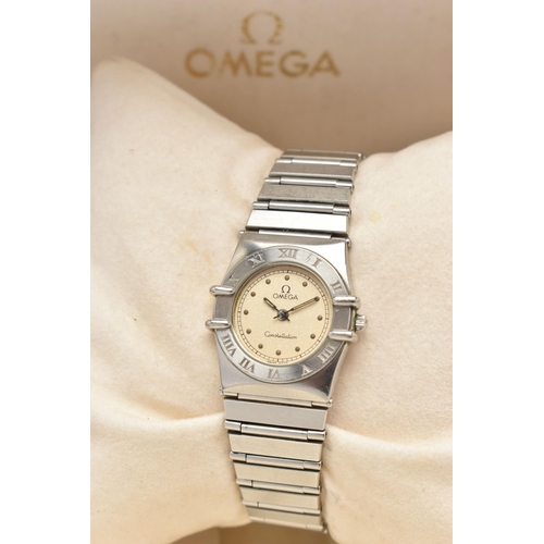 102 - A LADIES OMEGA AND LONGINES WRISTWATCH, a quartz movement, round champagne tone dial signed 'Omega' ... 