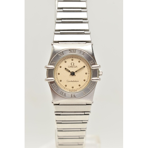 102 - A LADIES OMEGA AND LONGINES WRISTWATCH, a quartz movement, round champagne tone dial signed 'Omega' ... 