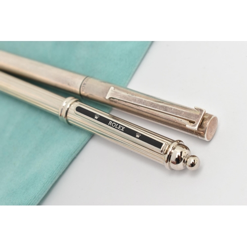 110 - A 'TIFFANY' AND A 'ROLEX' PEN, polished ball point pen with T shape clip, signed 'Tiffany & Co' stam... 