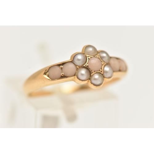 71 - AN EARLY 20TH CENTURY CLUSTER RING, a floral design cluster, set with six seed pearls and five caboc... 