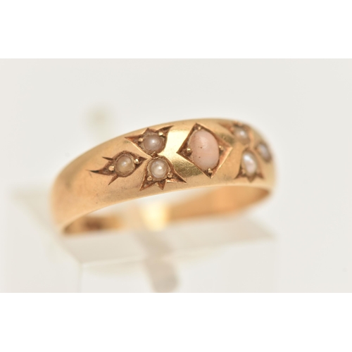 73 - AN 18CT GOLD CORAL AND SEED PEARL RING, a yellow gold band ring prong set with an oval cabochon cora... 