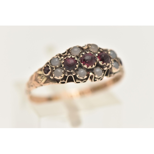 78 - A LATE VICTORIAN 9CT GOLD RING, set with five graduating very worn red paste stones, within a surrou... 