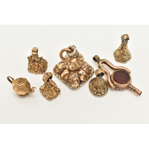 86 - A SELECTION OF GOLD PLATED FOB SEALS, A SWIVEL WATCH KEY AND A CHARM, to include a larger square sha... 