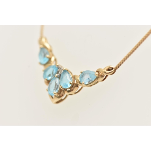 91 - A 9CT GOLD TOPAZ AND DIAMOND NECKLACE, the V shape pendant set with five pear cut blue topaz and a s... 