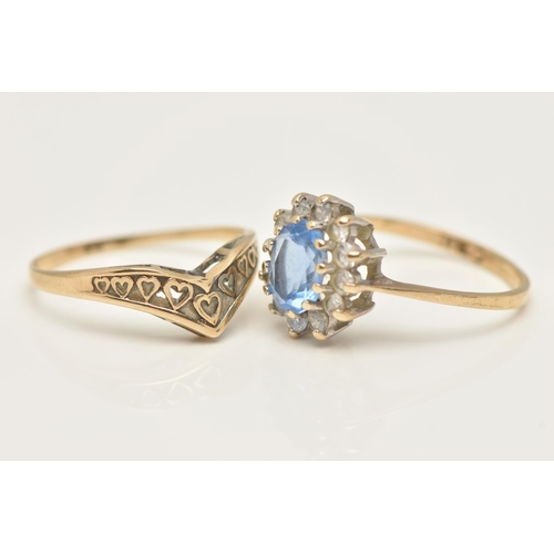 96 - TWO 9CT GOLD RINGS, the first an oval cluster ring, set with a central oval cut light blue stone and... 