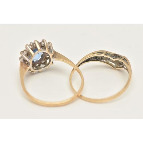 96 - TWO 9CT GOLD RINGS, the first an oval cluster ring, set with a central oval cut light blue stone and... 