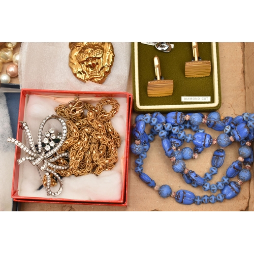 141 - A BOX OF ASSORTED COSTUME JEWELLERY, to include a selection of beaded necklaces, chain necklaces, a ... 