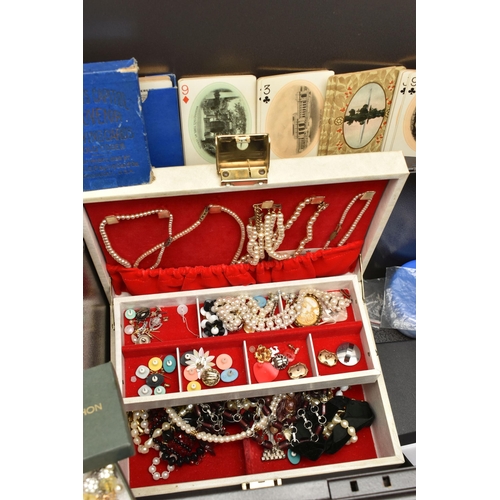 150 - A LARGE STORAGE TIN WITH COSTUME JEWELLERY AND WATCHES, to include an assortment of ladies and gents... 