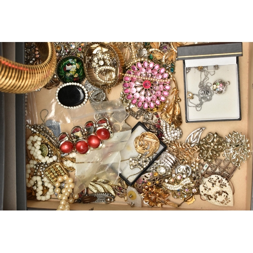 151 - A LARGE BOX OF ASSORTED COSTUME JEWELLERY, to include a 'Swarovski' necklace, assorted necklaces, br... 