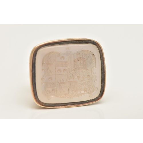 79 - A YELLOW METAL FOB SEAL, of a rectangular form, set with an intaglio white chalcedony inlay, depicti... 