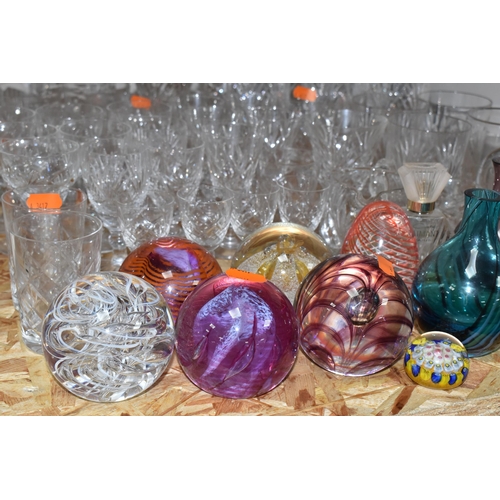 306 - A COLLECTION OF GLASS ORNAMENTS AND ASSORTED WARES to include a group of paperweights to include two... 