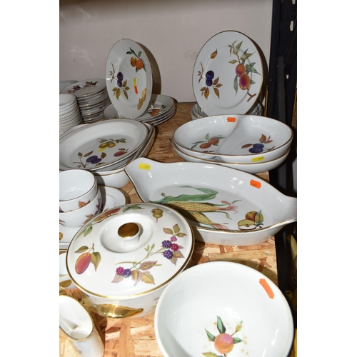 317 - A LARGE QUANTITY OF ROYAL WORCESTER 'EVESHAM' PATTERN OVEN TO TABLEWARE, comprising two graduated fl... 