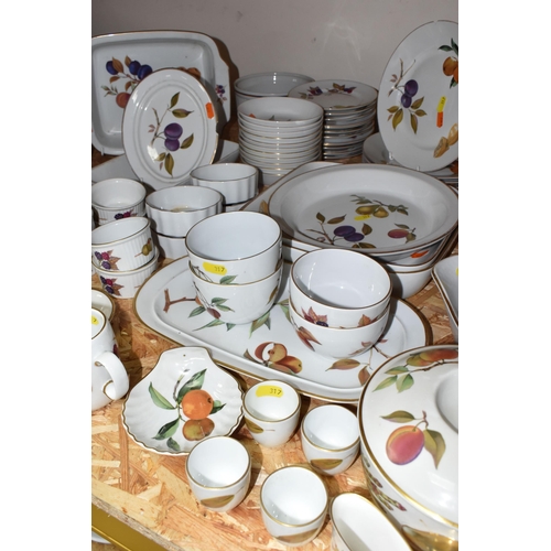 317 - A LARGE QUANTITY OF ROYAL WORCESTER 'EVESHAM' PATTERN OVEN TO TABLEWARE, comprising two graduated fl... 