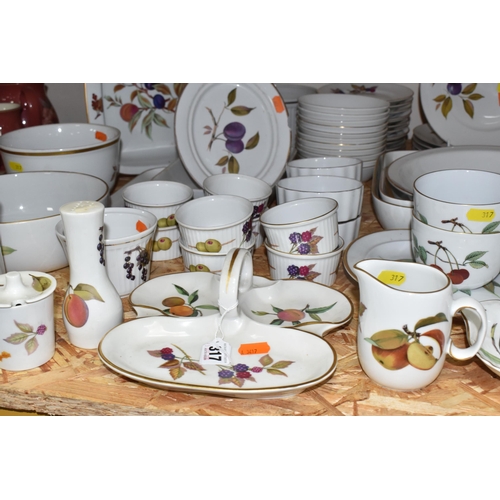 317 - A LARGE QUANTITY OF ROYAL WORCESTER 'EVESHAM' PATTERN OVEN TO TABLEWARE, comprising two graduated fl... 